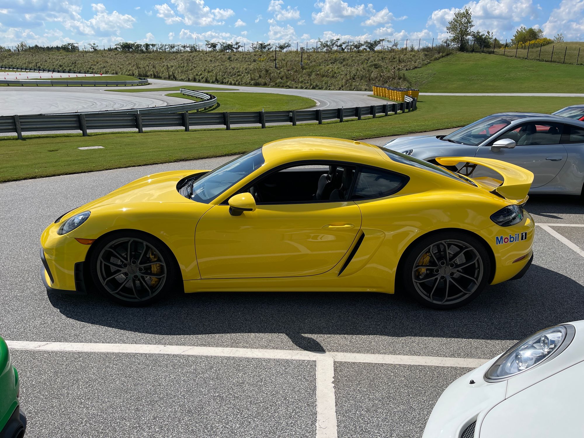 Yellow Porsche GT4