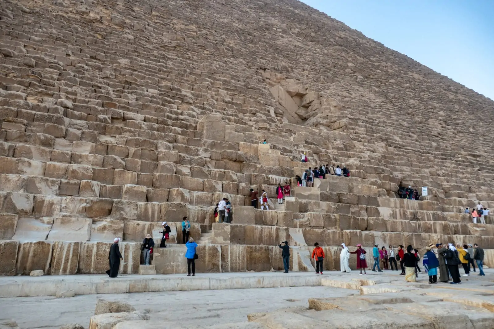 People Climbing the Pyramid